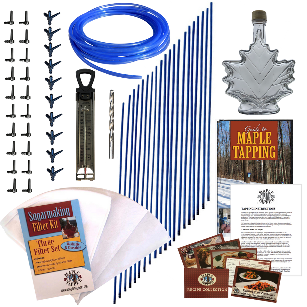 Image shows items included in the Ultimate Maple Tapping tubing Kit: 20 black plastic spiles, 10 black plastic dropline connectors, premium candy thermometer, 5/16” wood boring drill bit, 20 3 foot long 5/16” dropline tubes, 50-foot coil of blue 5/16” tubing, 250 milliliter maple leaf shaped glass bottle, three piece sugarmaking filter kit, guide to maple tapping book, instruction sheet, and five recipe cards