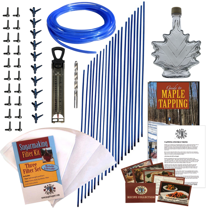 Image shows items included in the Ultimate Maple Tapping tubing Kit: 20 black plastic spiles, 10 black plastic dropline connectors, premium candy thermometer, 5/16” wood boring drill bit, 20 3 foot long 5/16” dropline tubes, 50-foot coil of blue 5/16” tubing, 250 milliliter maple leaf shaped glass bottle, three piece sugarmaking filter kit, guide to maple tapping book, instruction sheet, and five recipe cards